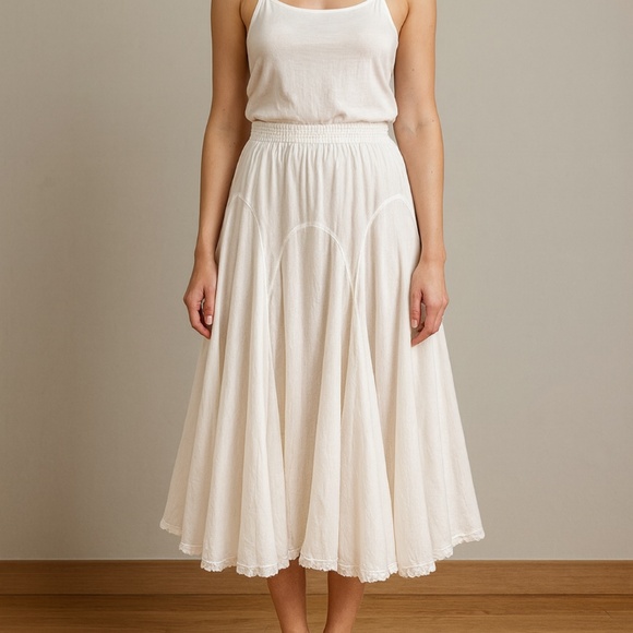 A charming, bohemian skirt radiates an effortless, feminine vibe. This crisp whi - Picture 1 of 3
